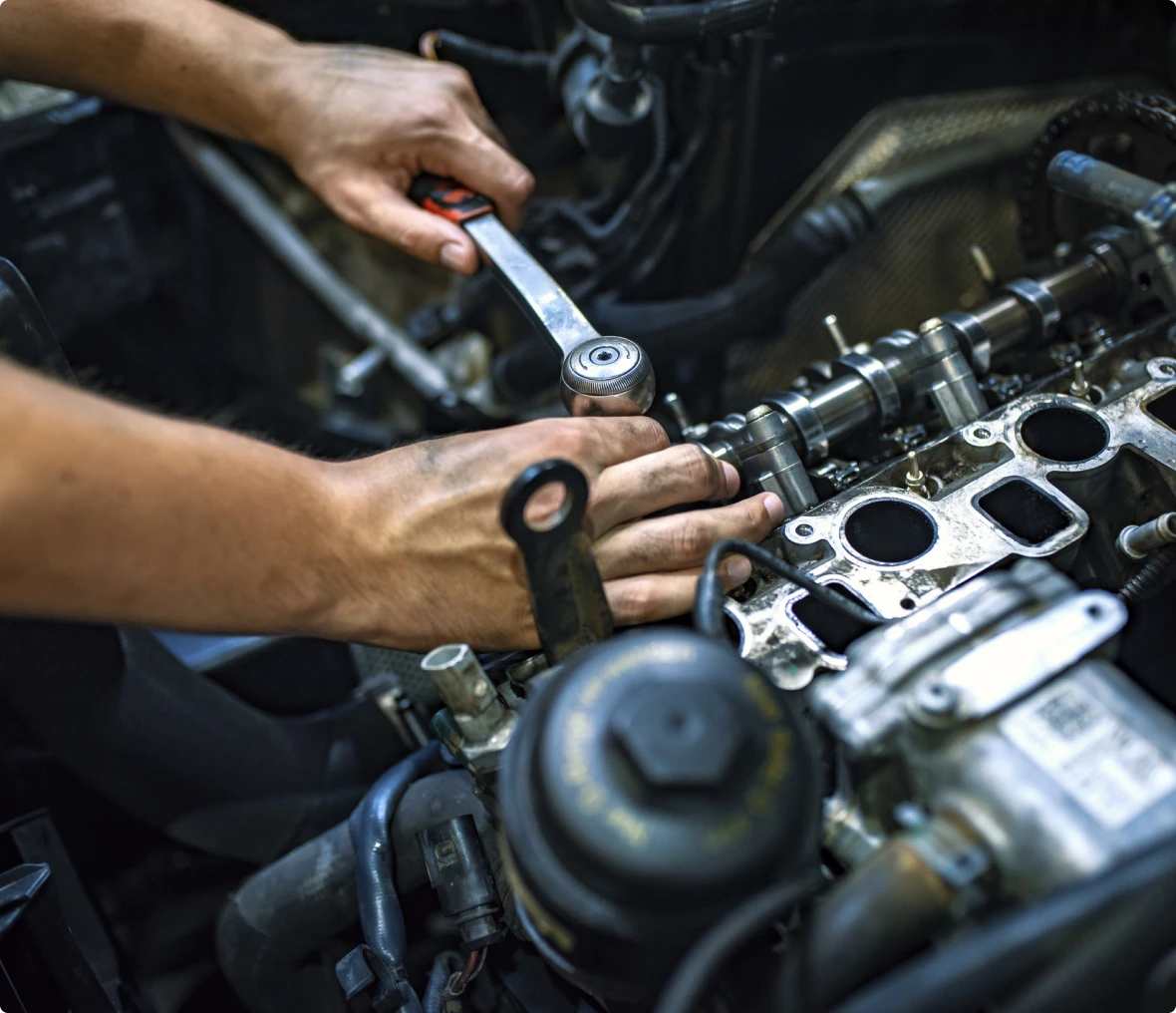 Hands fixing vehicle engine